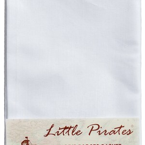 May include: A folded stack of two white percale sheets for a pram, crib, or Moses basket. The packaging features the "Little Pirates" logo with a ship illustration and text indicating the sheets are pram size.