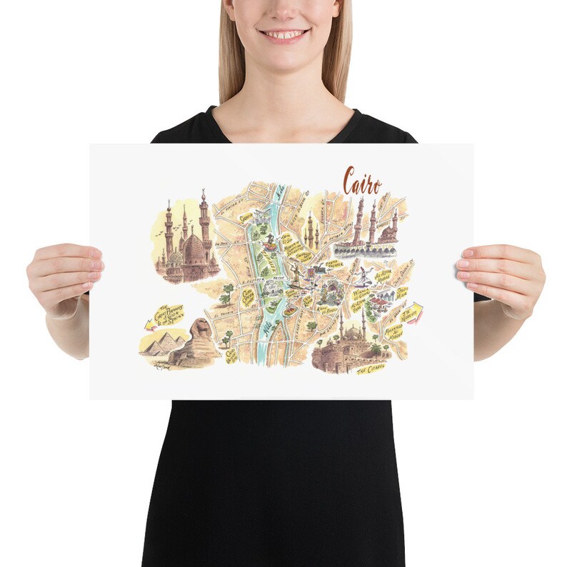May include: A hand-drawn illustrated map of Cairo, Egypt, featuring landmarks like the Great Pyramids, the Sphinx, and the Citadel. The map is in a vintage style with brown, yellow, and green colors.