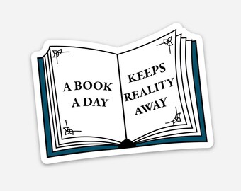 Puede incluir: Una pegatina de un libro abierto con el texto "Un libro al día mantiene la realidad a raya".