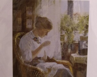 Cross stitch kit "Sewing young woman at the window" by Estibaliz Estudio