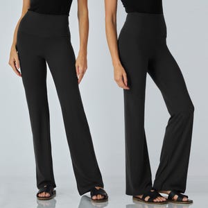 May include: Two pairs of black yoga pants with a high waistband. The pants have a flared leg design. The models are wearing black sandals. The background is a light gray.