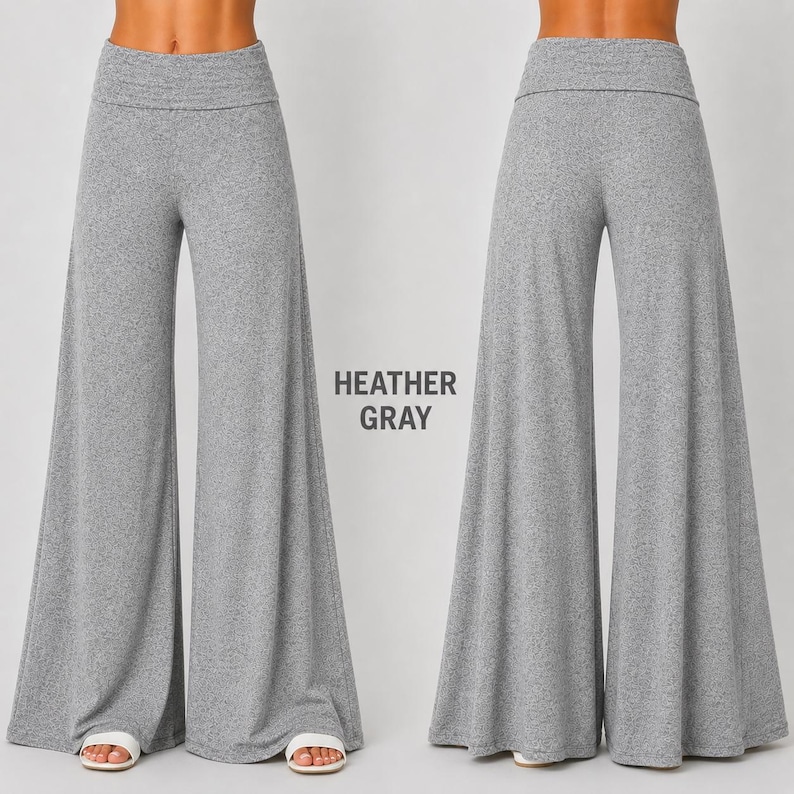 Puede incluir: Pantalones de pierna ancha en color gris jaspeado con cintura alta plegable. Los pantalones se muestran desde la vista frontal y trasera, exhibiendo una silueta holgada y fluida que llega hasta el suelo. El texto HEATHER GRAY es visible.