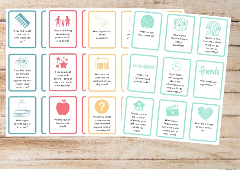 May include: A set of 20 colorful conversation starter cards with various icons and questions. The cards are printed on white cardstock and have rounded corners. The cards are designed to help people get to know each other better.