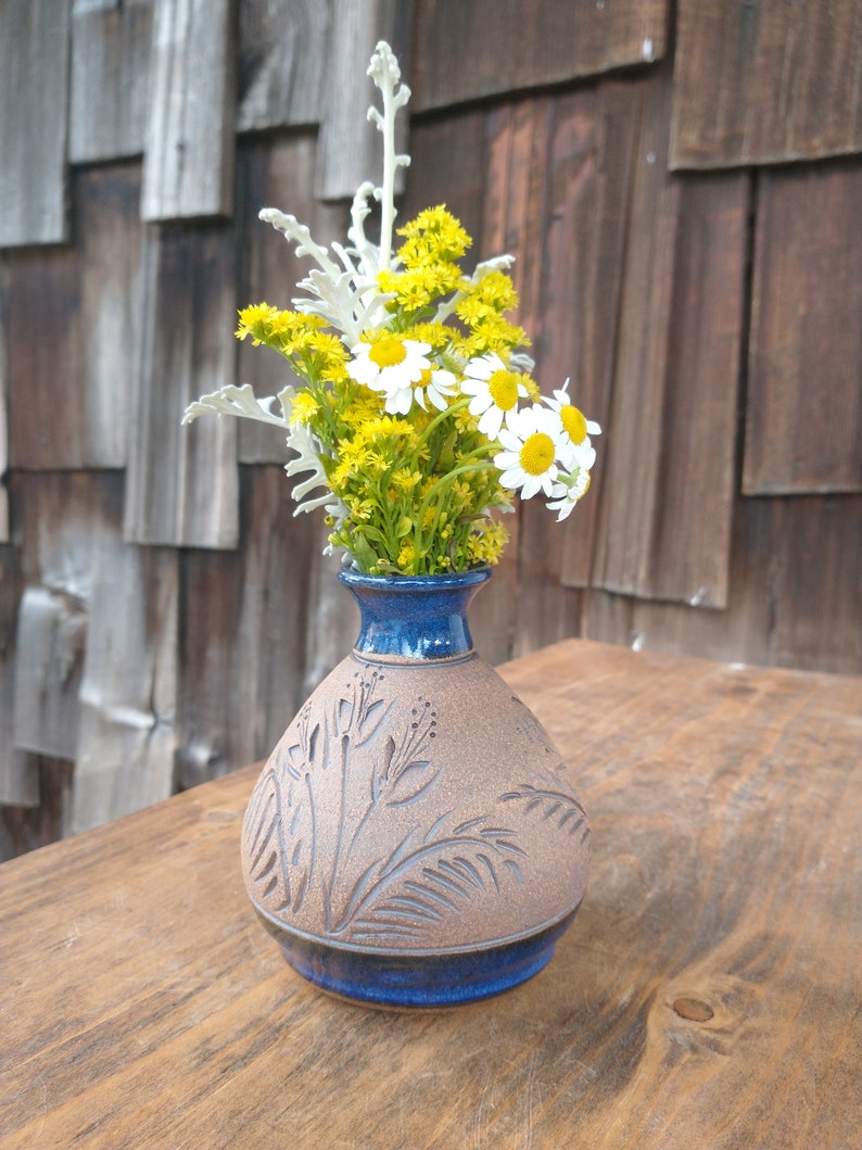Small blue wildflower vase