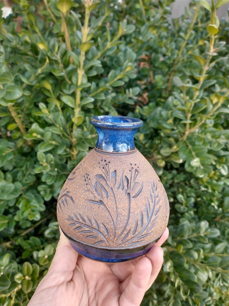 Small blue wildflower vase