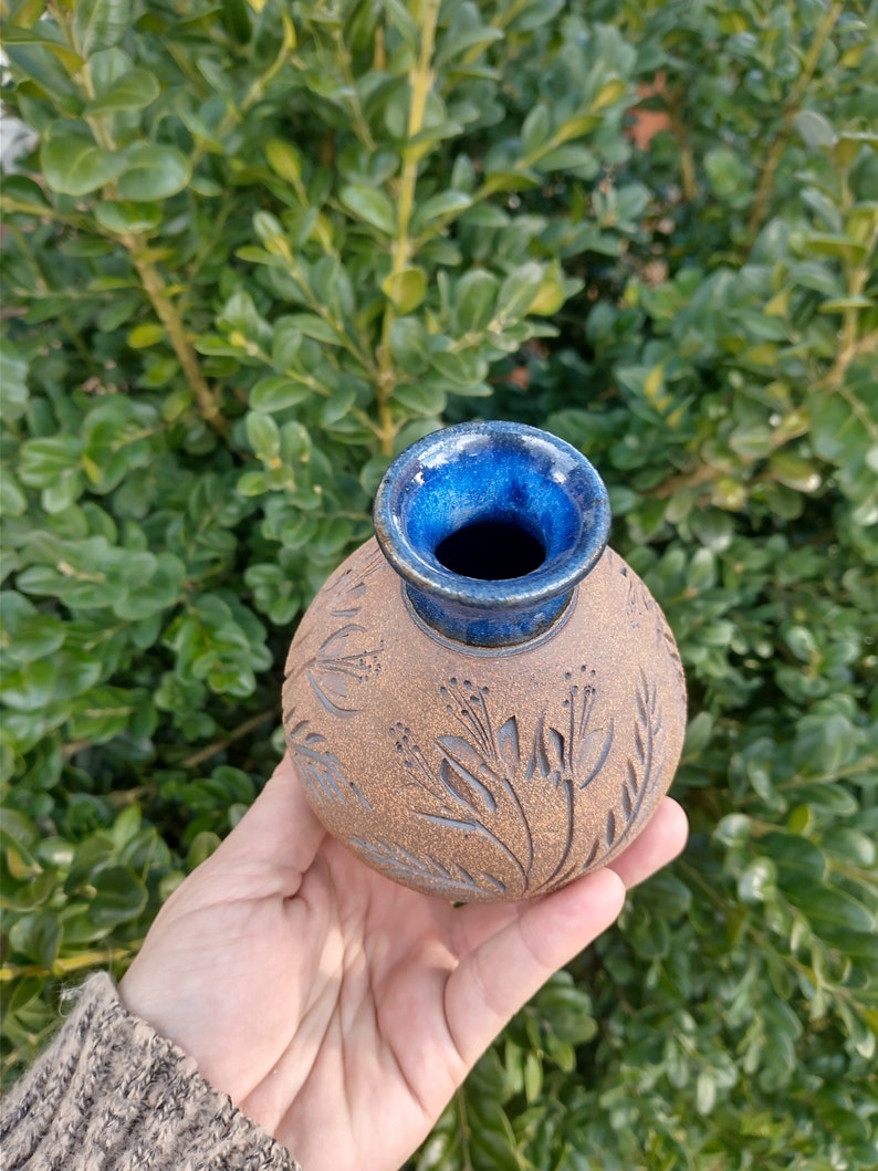 Small blue wildflower vase