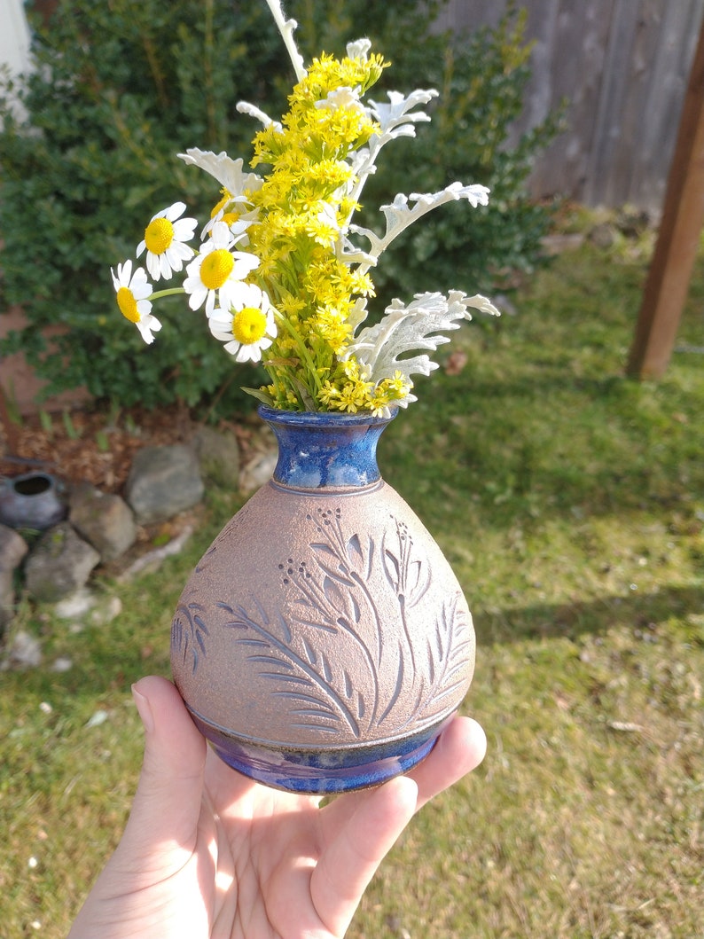 Small blue wildflower vase