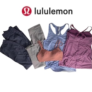 May include: Assortment of Lululemon athletic wear, including navy blue pants, gray leggings, a light blue tank top, a peach-colored sports bra, and a purple tank top. The Lululemon logo is visible in the top left corner.