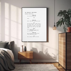 May include: A framed black and white print of a movie script titled "Coyote Ugly." The script is displayed in a minimalist style, with text on a white background. The print is displayed in a bedroom setting.