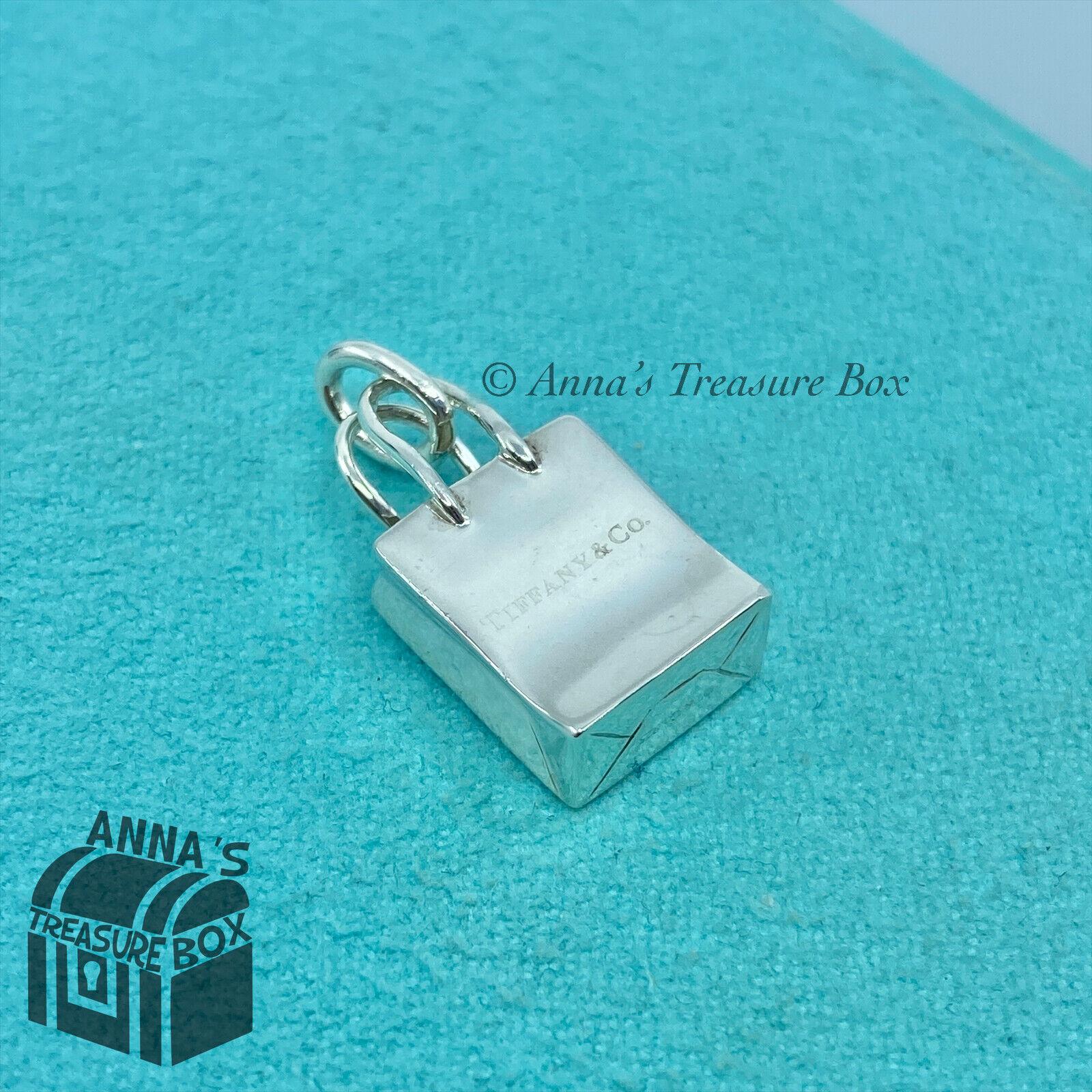 Tiffany & Co. 925 Silver Shopping Bag Charm Pendant (box + Tiffany & Co. 925 Silver Shopping Bag Charm Pendant (box +
