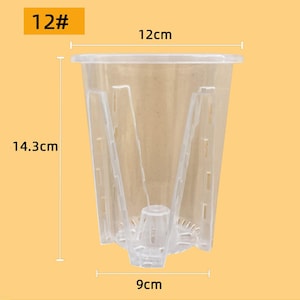 May include: Clear plastic plant pot, measuring 14.3cm high, 12cm wide, and 9cm across the base. The pot has a flared top and vertical supports. The text "12#" is in a yellow rectangle.