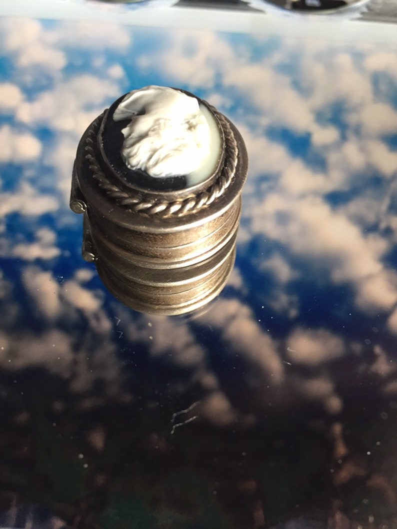 Unusual antique sterling silver 925 pill box with cameo black and white top.