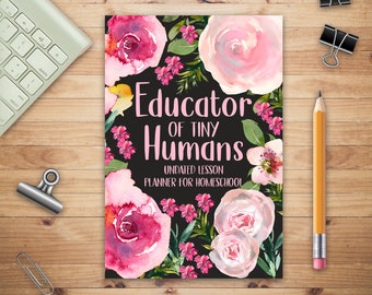 Puede incluir: Un planificador negro con diseños florales rosas y el texto "Educator of Tiny Humans Undated Lesson Planner for Homeschool"