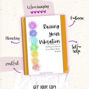 May include: A book titled "Raising Your Vibration" with a white cover and gold spine. The cover features colorful chakra symbols. Text includes "28 Ways to Elevate Your Mind, Body, & Spirit." The image also includes the text "THE NEW BOOK" and "GET YOUR COPY."
