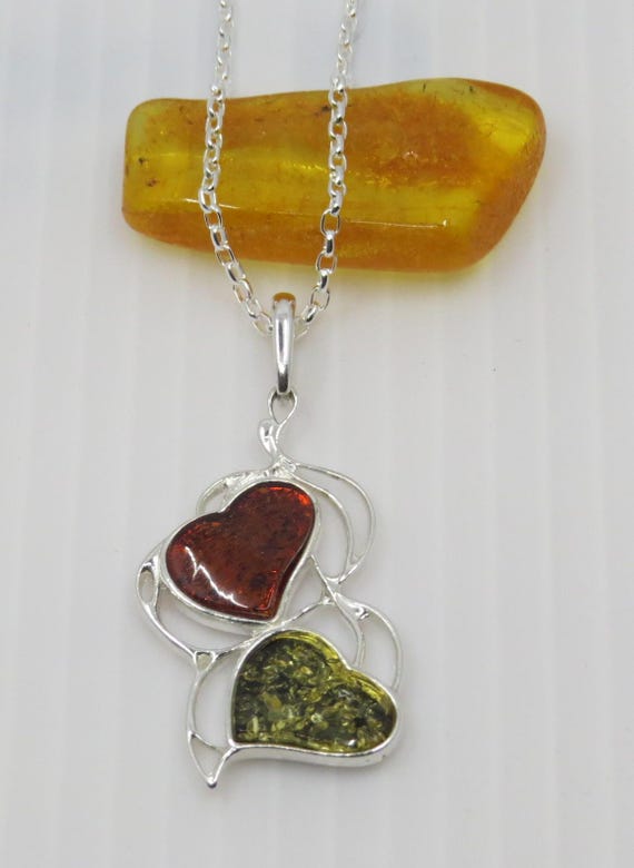 Handmade Baltic Amber Heart Pendant set in sterling silver