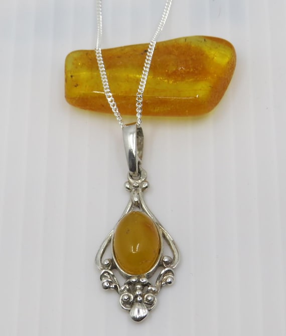 Beautiful Handmade Butterscotch Baltic Amber pendant set in sterling silver