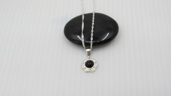 Handmade black onyx pendant set In sterling silver
