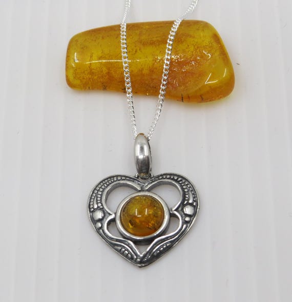 Handmade Baltic Amber heart pendant set in sterling silver