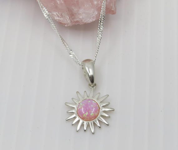 Handmade pink opal sun pendant set in sterling silver