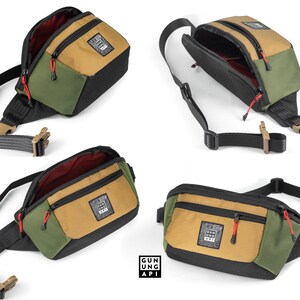 May include: A multi-angle product shot of a waist bag in various positions. The bag features a color block design with tan, olive green, and black panels. It has a black strap, a tan buckle, and a red zipper pull. The bag has the text "GUN UNG API".
