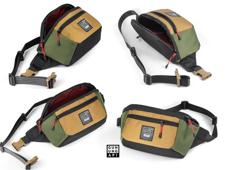 May include: A multi-angle product shot of a waist bag in various positions. The bag features a color block design with tan, olive green, and black panels. It has a black strap, a tan buckle, and a red zipper pull. The bag has the text "GUN UNG API".