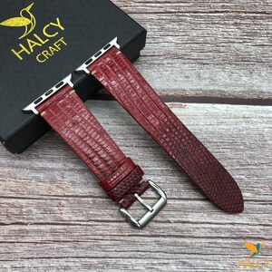 May include: Two red leather Apple Watch bands with a silver buckle. The bands have a textured, snake-like pattern. The text "HALCY CRAFT" is visible on a black box.