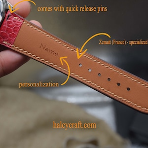 May include: A brown leather watch strap with white stitching. The strap has a quick release pin and is personalised with the name "Name". The strap is made by Zematt (France) and has a waterproof leather lining.