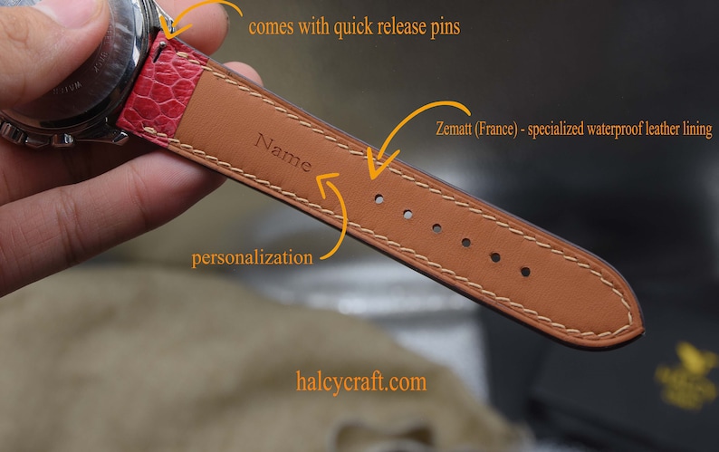 May include: A brown leather watch strap with white stitching. The strap has a quick release pin and is personalised with the name "Name". The strap is made by Zematt (France) and has a waterproof leather lining.
