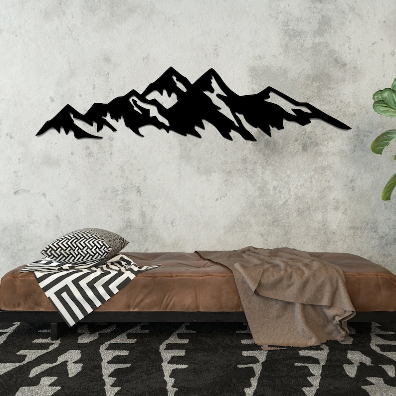 Metal Mountain Wall Art: A captivating depiction of mountain peaks crafted in durable metal, perfect for adding natural charm to any room.