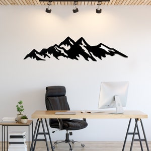 Metal Mountain Wall Art: A captivating depiction of mountain peaks crafted in durable metal, perfect for adding natural charm to any room.