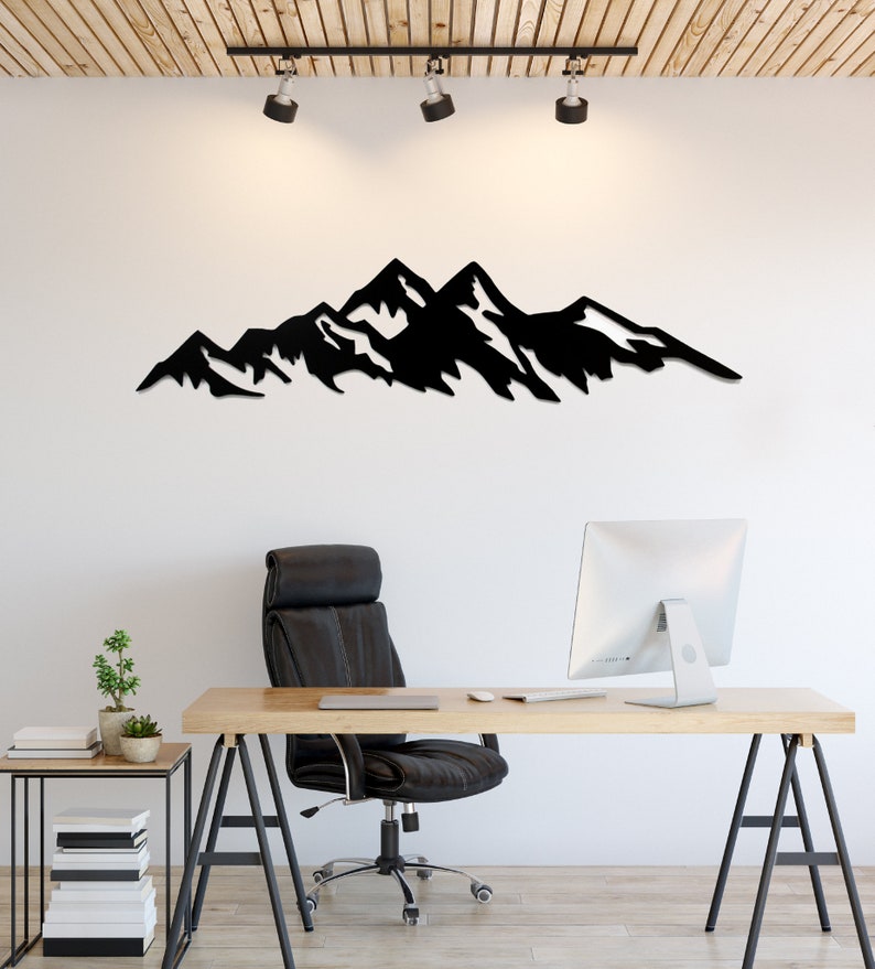 Metal Mountain Wall Art: A captivating depiction of mountain peaks crafted in durable metal, perfect for adding natural charm to any room.