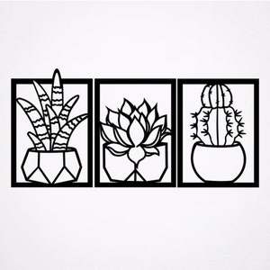 May include: Three black framed wall art prints featuring different types of succulents. The first print shows a succulent with long, thin leaves. The second print shows a succulent with round, fleshy leaves. The third print shows a cactus with spines.