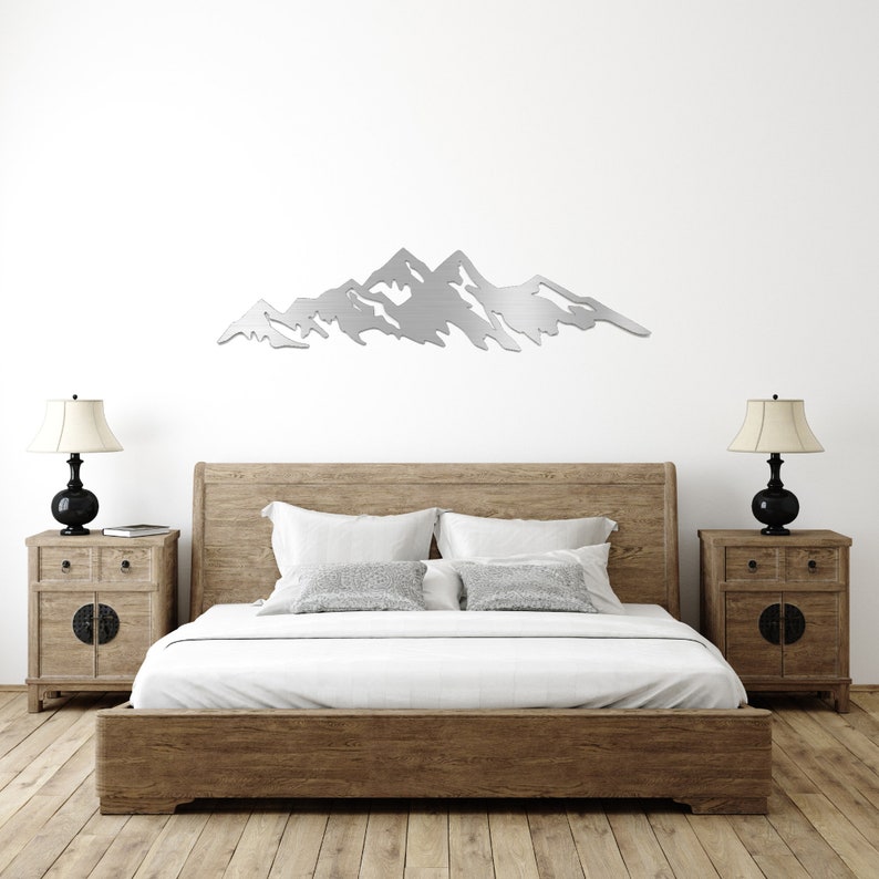 Metal Mountain Wall Art: A captivating depiction of mountain peaks crafted in durable metal, perfect for adding natural charm to any room.