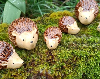 Small handmade ceramic hedgehog figurines