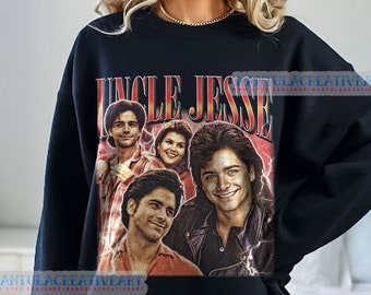 May include: Black sweatshirt featuring a vintage-style graphic print of the characters from the TV show "Full House" with the text "Uncle Jesse".