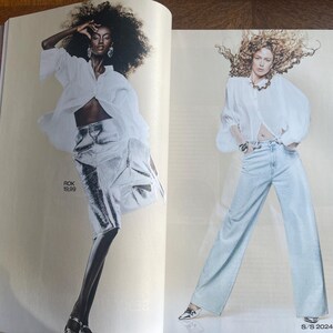 May include: A fashion magazine spread featuring two models. One model is in a white blouse and silver skirt, the other in a white blouse and light blue trousers. The H&M logo and S/S 2024 text are visible.