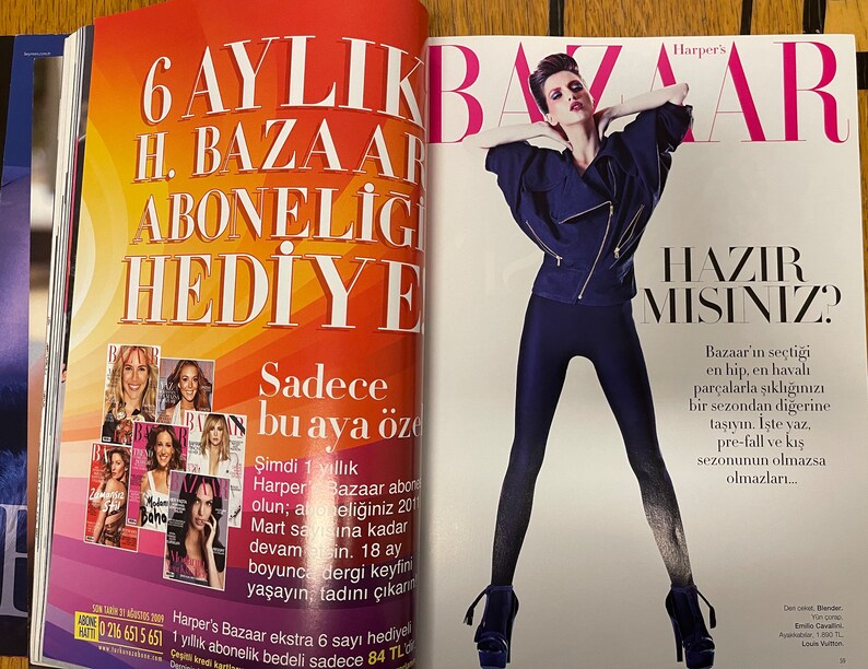 May include: A magazine cover featuring a woman wearing a blue denim jacket and black leggings. The magazine is titled "Harper's Bazaar" and the text "6 AYLIK H. BAZAAR ABONELİGİ HEDİYE" is in large font on the cover.
