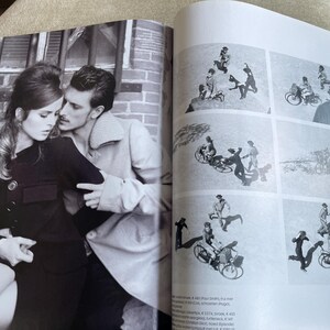 May include: A black and white magazine spread featuring a couple embracing in front of a brick wall. The right side of the spread shows six small images of people with bicycles.