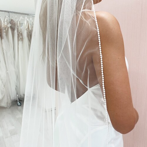 Hip length veil with Pearl and silver beading Beaded Trim Scalloped Hip Length Veil | Azazie main image 2