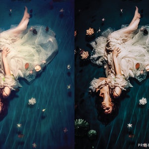 May include: A woman in a white dress lies on her back in a pool of water. The water is a deep blue color and there are white flowers floating on the surface. The woman's hair is long and dark, and she is looking up at the camera. The image is taken from a high angle, and the woman's body is stretched out in a relaxed pose. The image is a bit blurry, as if it was taken with a vintage camera.