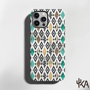 May include: A smartphone case featuring a repeating black and white geometric diamond pattern. The design incorporates alternating vertical columns of turquoise, gold, leopard print, and textured white shapes. The text Kactus Avenue is visible.