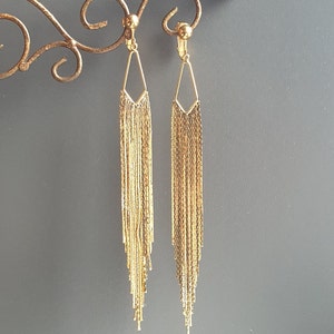 Long gold plated earrings. Clip-on ot stud.