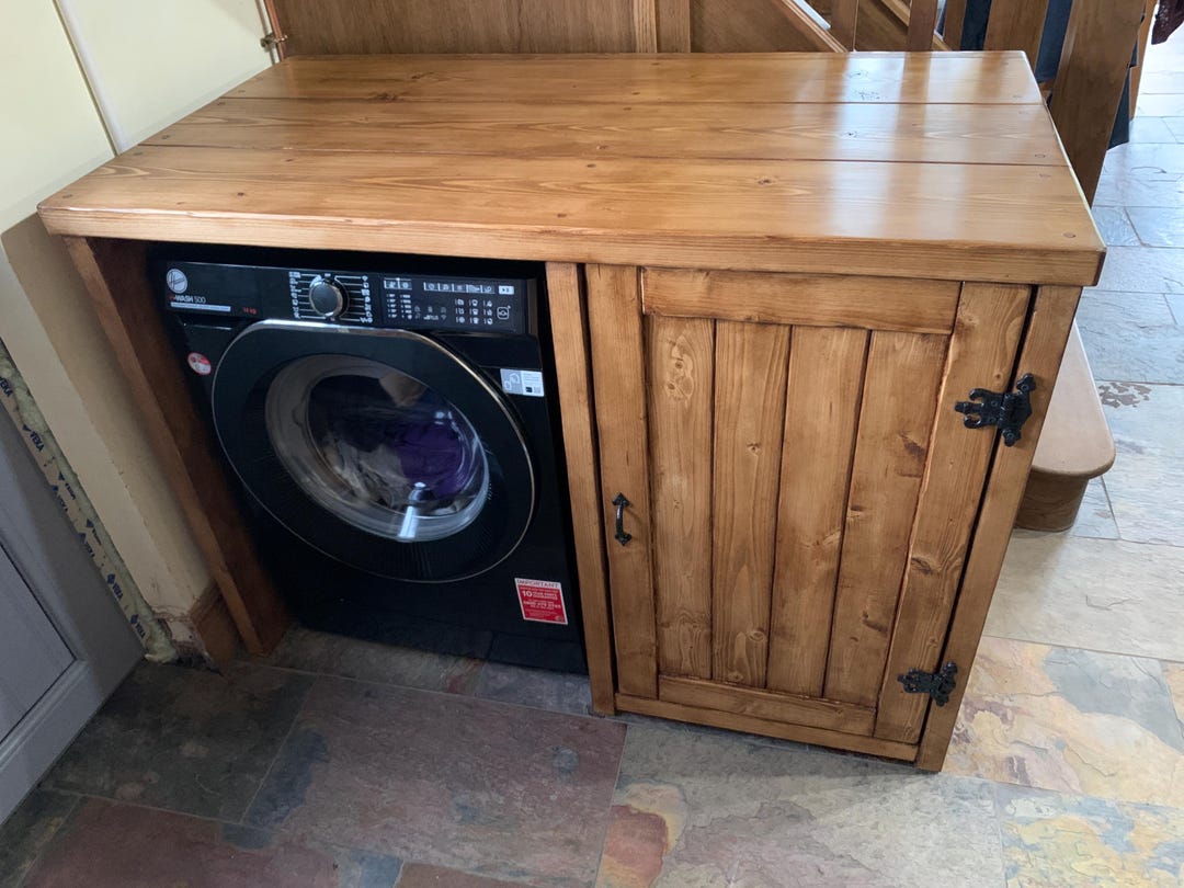 climate-controlled storage unit with washing machine on wooden pallet