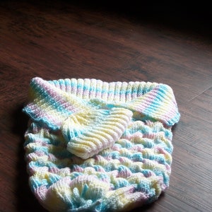 Bolso de bebé con sombrero
