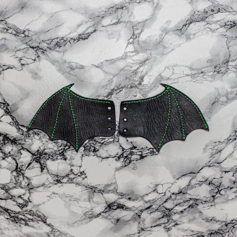 Boot Bat wings with green thread.