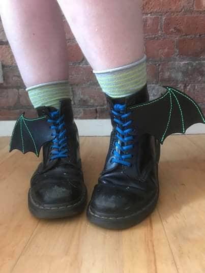 Boot Bat wings with green thread.