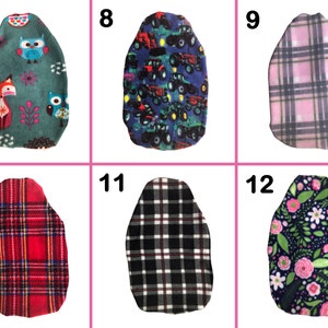 May include: Twelve different fabric swatches in various patterns and colors. The swatches are arranged in two rows of six, with numbers 7 through 12 labeling each swatch.