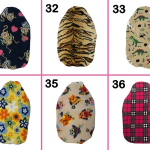 May include: Six different fabric designs for a hot water bottle cover. The designs include monkeys, tigers, dinosaurs, flowers, owls, and plaid.