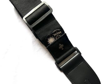 Adjustable Black Guitar Strap with Leather Ends and Metal Cross Charm