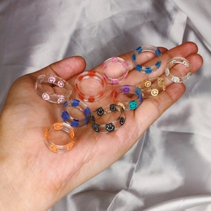 Mystery resin smiley face rings